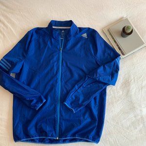 Adidas Blue running windbreaker in great condition!